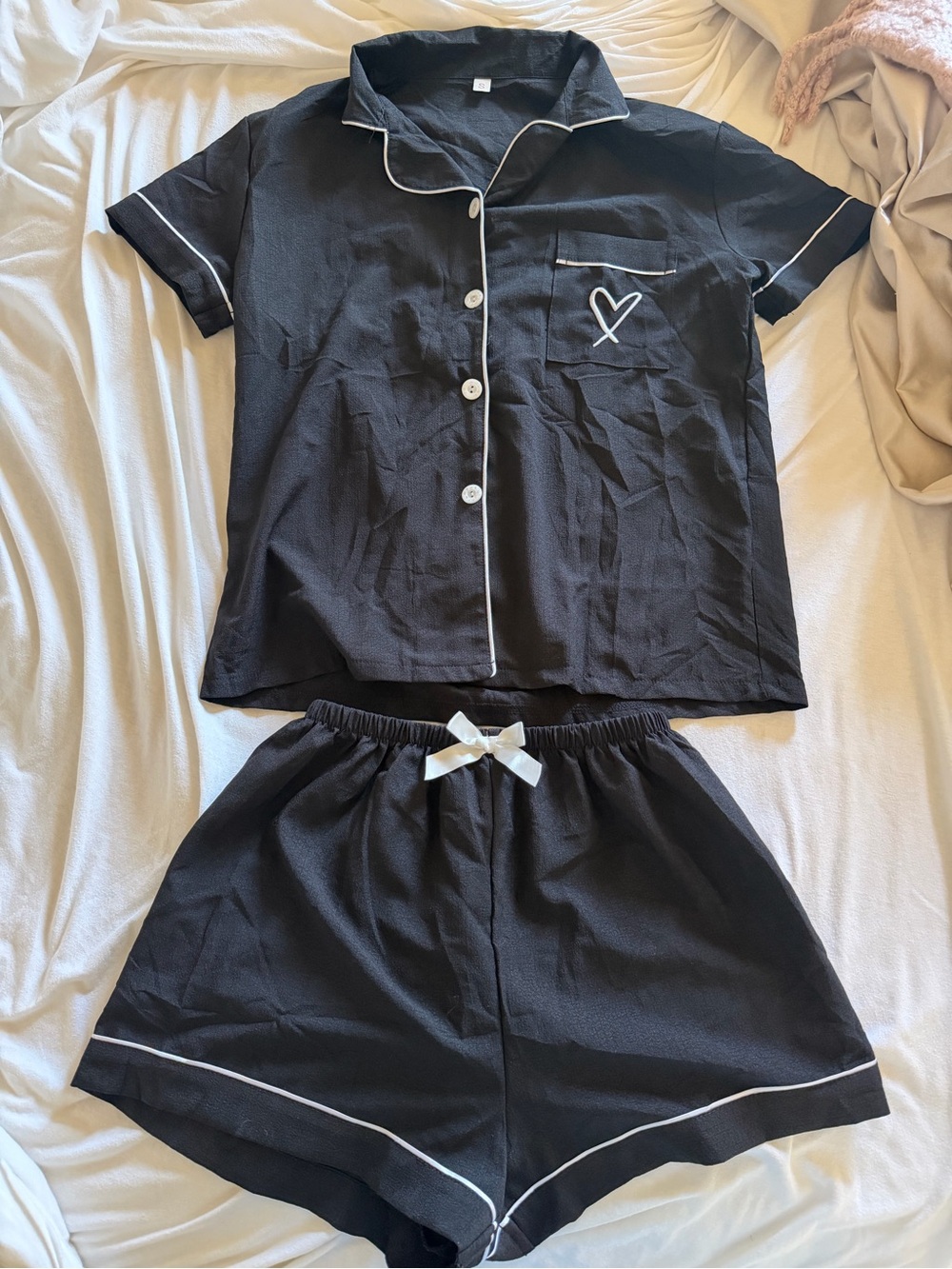 Black Short-Sleeve Pajama Set with White Trim and Heart Accent